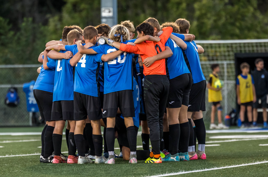 Lodi Boys Soccer team huddled before game against Richland Center 